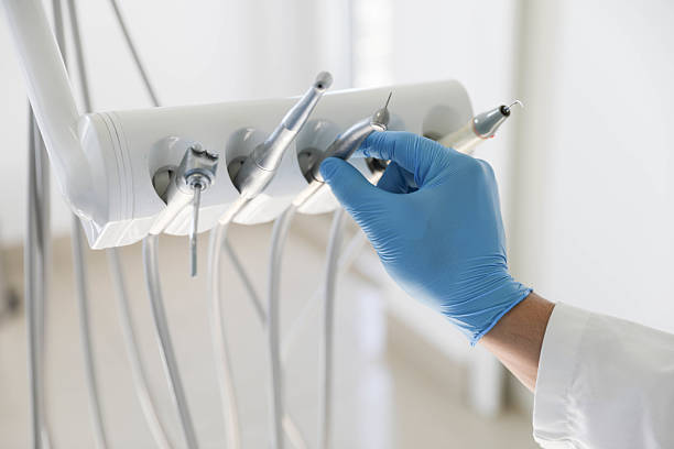 Professional Wisdom Tooth Removal technician working in Salt Creek Commons, IN